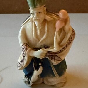 Netsuke Figurine with Green and Cream Accents